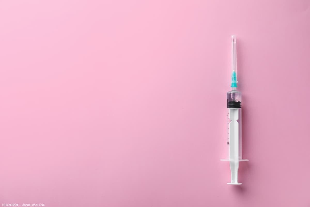 Injection needle on a pink background (Image credit: AdobeStock/Pixel-Shot)