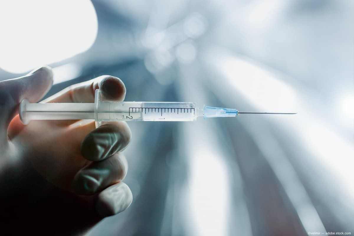 Hand in medical glove holding an injection needle (Image credit: AdobeStock/velimir)